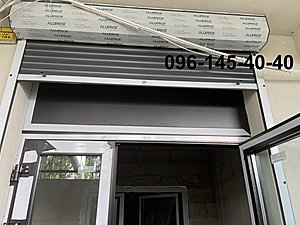Алюмінієві двері та захисні ролети від ТОВ Редвін Груп